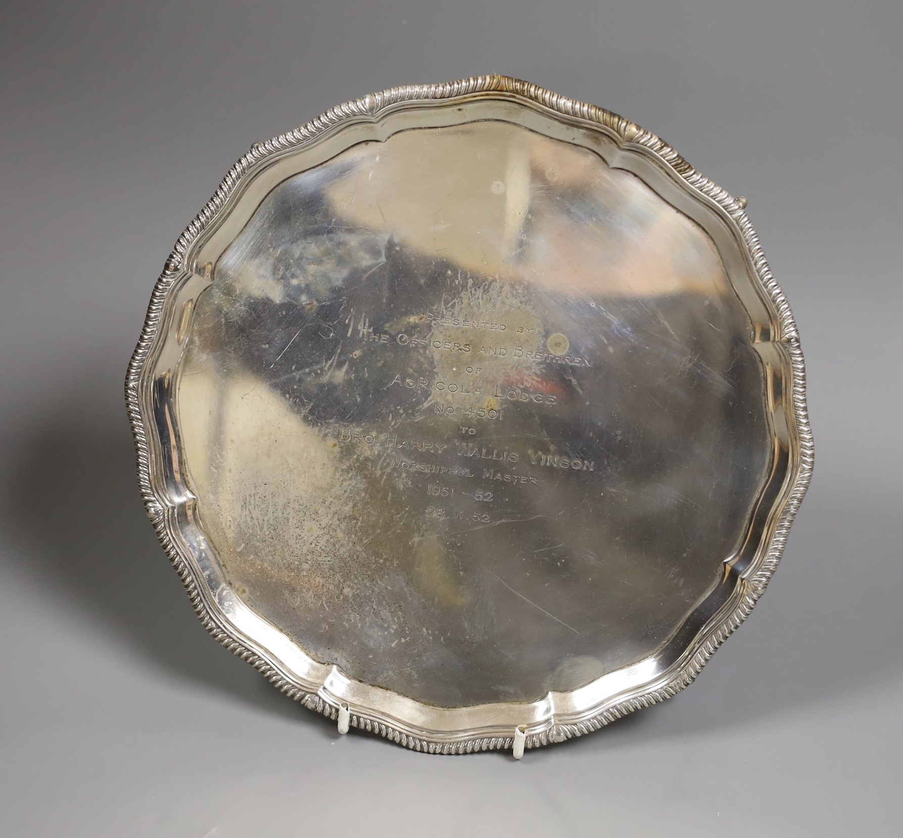 A 1950's silver presentation salver, with masonic related inscription, Goldsmiths & Silversmiths Co. Ltd, Sheffield 1952, 25.3cm, 20oz.
